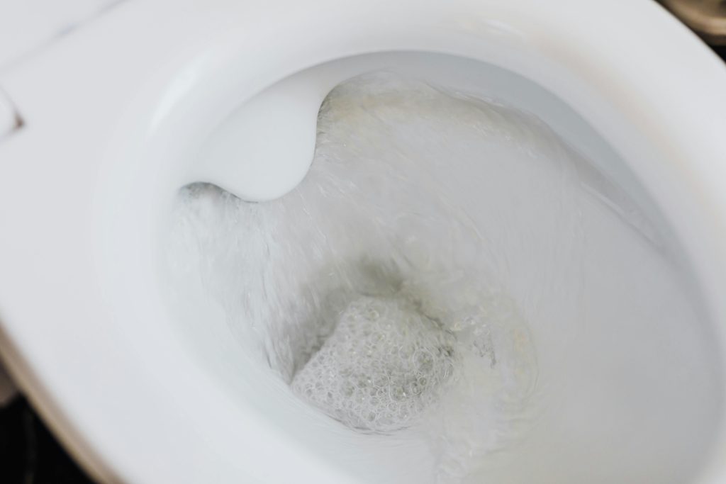 A toilet mid flush