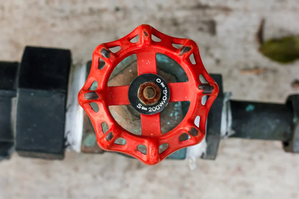 Current image: main water shutoff valve in Edmonton basement